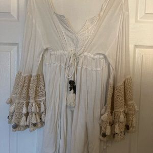 Beautiful bathing suit cover up made of gauze material with boho sleeves